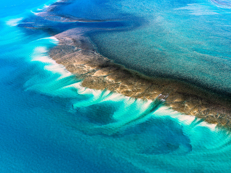 aerial photography of Montgomery reef, australia